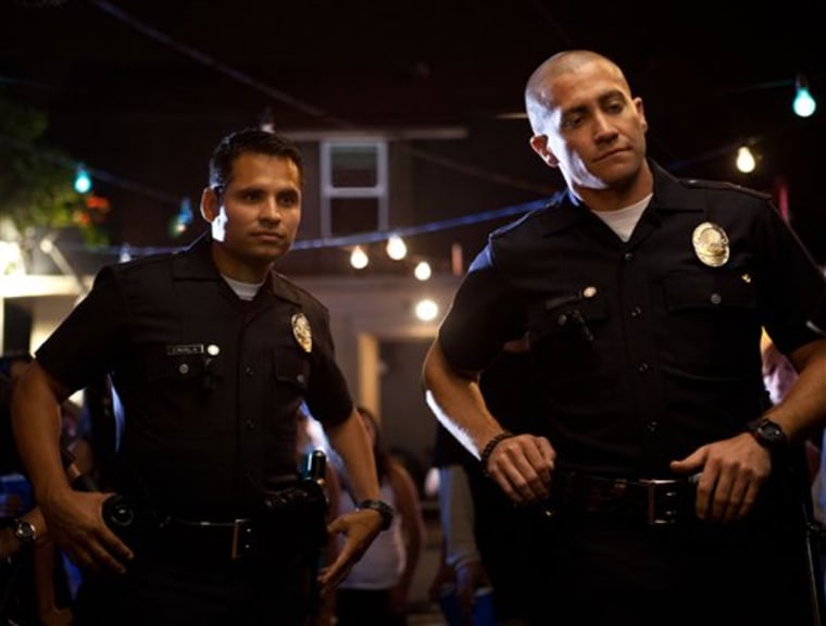 Michael Pena, left, and Jake Gyllenhaal in a scene from